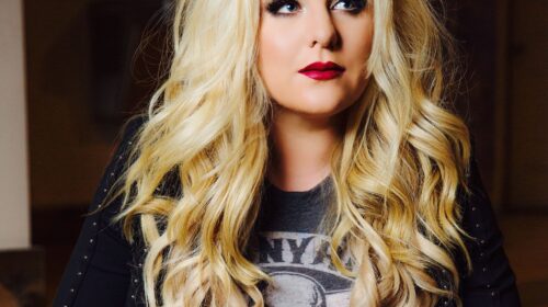 Hannah Anders Releases "Redneck Riding Hood'' Music Video - Your favorite childhood fairytale meets modern country femininity in rising country star Hannah Anders single & music video “Redneck Riding Hood”! Alluding to the famous tale of Little Red Riding Hood, Anders puts a modern country spin on it, transforming the character from an innocent naive little girl to a confident, independent, spunky, and powerful woman. Lyrics from the song include, “Every man’s weakness, every young boy’s dream/There ain’t a race in Talladega she ain’t seen”. A song full of humor, empowerment, and spice.