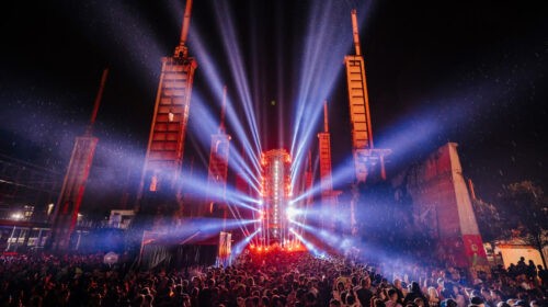 A lively crowd at Kappa Futurfestival, illuminated by bright lights