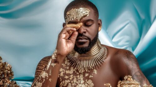 Album cover: 'Before the Feast EP' by Falz. A golden and gleaming cover, radiating opulence and elegance.