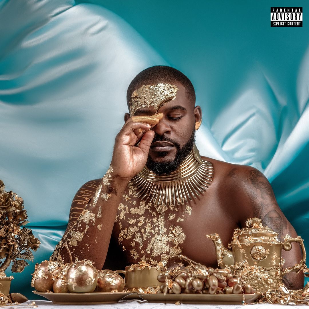 Album cover: 'Before the Feast EP' by Falz. A golden and gleaming cover, radiating opulence and elegance.